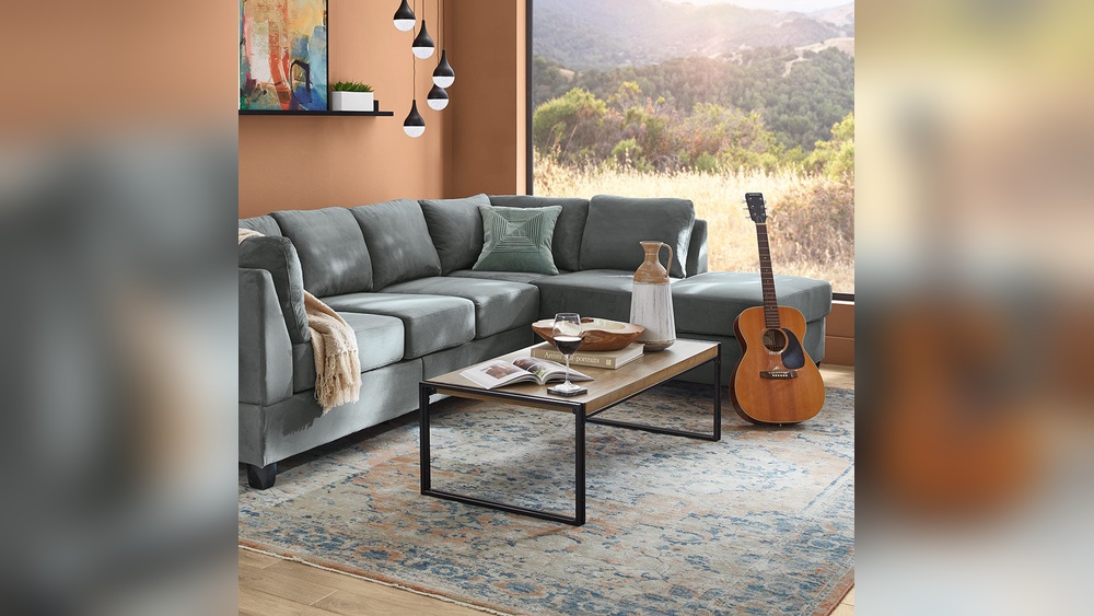 Should Living Room Rug Go under Furniture